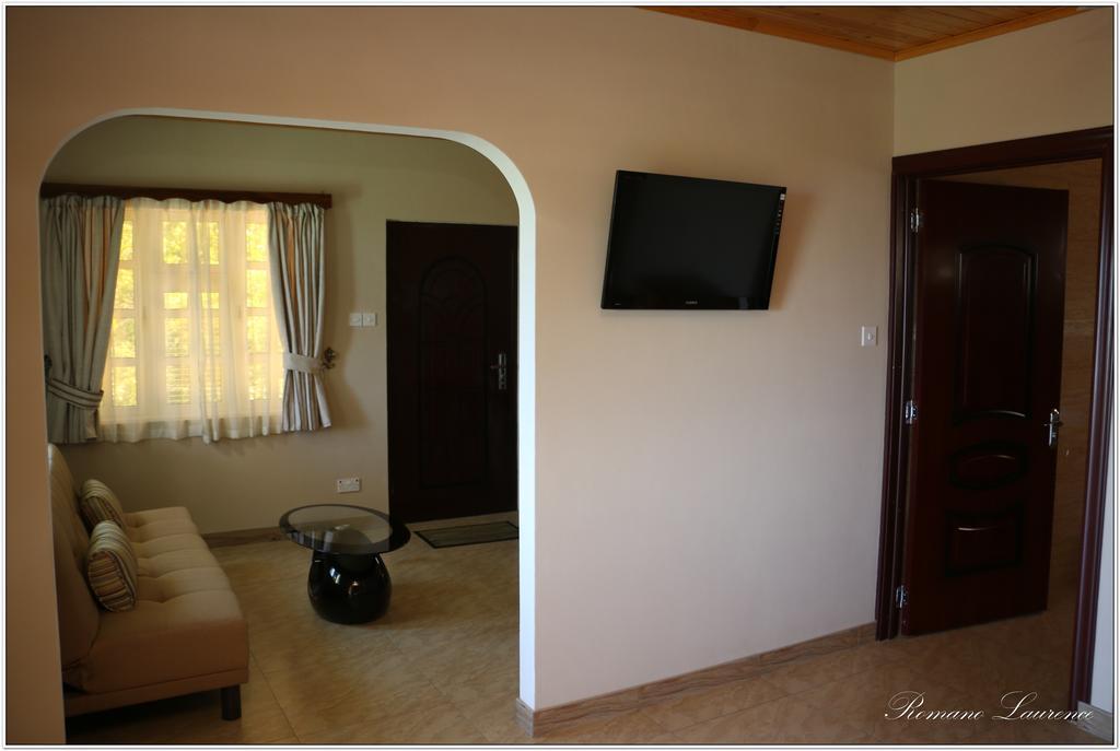 Exotic Guest House Anse Volbert Village Habitación foto